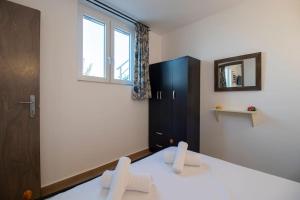Katil atau katil-katil dalam bilik di Sunset View Apt in South Crete