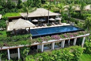 Photo de la galerie de l'établissement Andara Resort Villas, à Kamala Beach