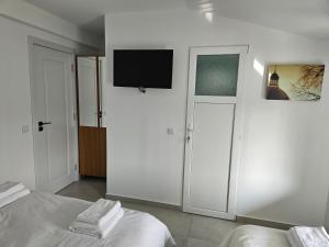Postel nebo postele na pokoji v ubytování CASA Cristian