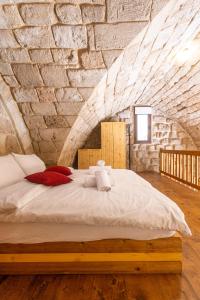 Postel nebo postele na pokoji v ubytování Old Town Guesthouses