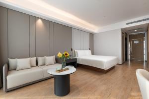 Postel nebo postele na pokoji v ubytování Atour Hotel Guangzhou Yueqiao Branch
