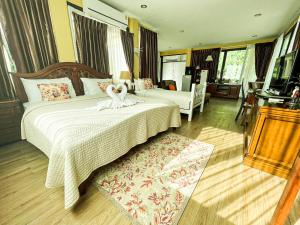 Voodi või voodid majutusasutuse Vongdeuan Resort toas