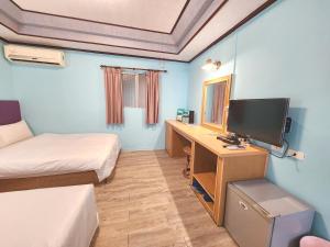 TV a/nebo společenská místnost v ubytování 大潭山莊 Da Tan Mountain INN