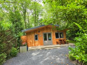 Zahrada ubytování Tiny Lodge met prive Jacuzzi
