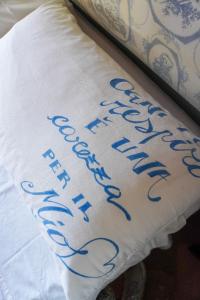 A bed or beds in a room at Holiday Home La Casetta delle Candele