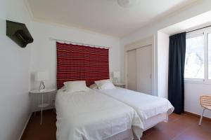 Posteľ alebo postele v izbe v ubytovaní Gran terraza con vistas al mar + 11 fotografií