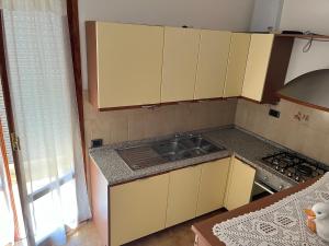 Kuchyň nebo kuchyňský kout v ubytování Residenza Sandrini