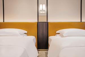 YTL ChangChengYunYue Hotel客房内的一张或多张床位