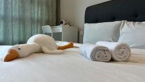 JQ 合一民宿3 Unity Homestay 3 NEW 5pax Netflix Cinema客房内的一张或多张床位