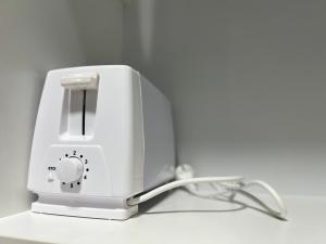 哥打京那巴鲁JQ 合一民宿3 Unity Homestay 3 NEW 5pax Netflix Cinema的相册照片