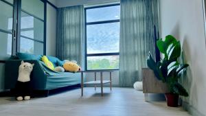 JQ 合一民宿3 Unity Homestay 3 NEW 5pax Netflix Cinema的休息区
