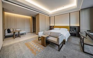 YTL ChangChengYunYue Hotel客房内的一张或多张床位