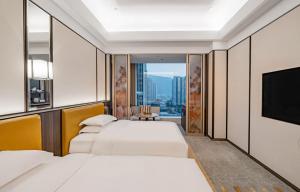 YTL ChangChengYunYue Hotel客房内的一张或多张床位
