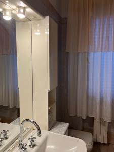 Koupelna v ubytování Residenza Sandrini + 26 fotografií