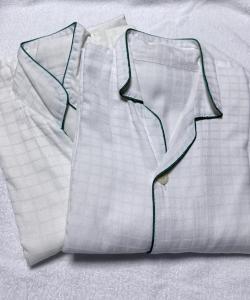 a white shirt with a green stripe on it at Nissay Hotel Fukuoka - Vacation STAY 79962v in Fukuoka