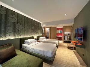 Postel nebo postele na pokoji v ubytování Banlansuan Resort SHA Plus