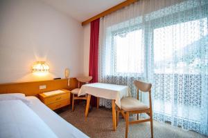 Postel nebo postele na pokoji v ubytování Alara Rooms