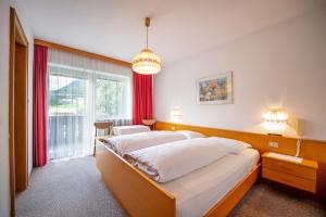 Postel nebo postele na pokoji v ubytování Alara Rooms