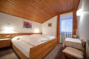 Postel nebo postele na pokoji v ubytování Alara Rooms