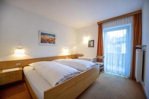 Postel nebo postele na pokoji v ubytování Alara Rooms