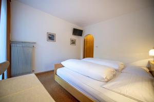 Postel nebo postele na pokoji v ubytování Alara Rooms