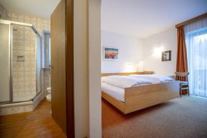 Postel nebo postele na pokoji v ubytování Alara Rooms