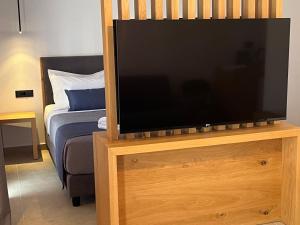 TV in/ali zabaviščno središče v nastanitvi Moonlight Hotel