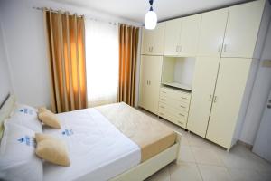 Ένα ή περισσότερα κρεβάτια σε δωμάτιο στο Apartment Rivaaa