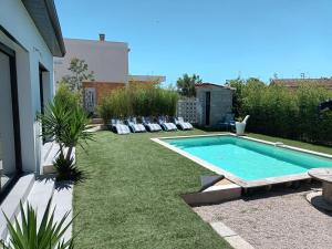 Bazén v ubytování Villa au cœur de la Camargue avec Piscine Privative nebo v jeho okolí