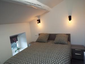 Postel nebo postele na pokoji v ubytování Valentins cottage Moulin de Tartay Avignon + 21 fotografií