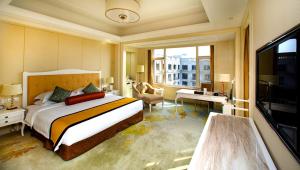 Voodi või voodid majutusasutuse Nanjing Dongjiao State Guesthouse toas