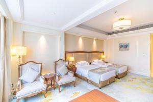 Voodi või voodid majutusasutuse Nanjing Dongjiao State Guesthouse toas