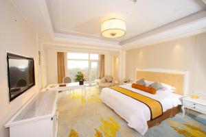Voodi või voodid majutusasutuse Nanjing Dongjiao State Guesthouse toas