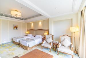 Voodi või voodid majutusasutuse Nanjing Dongjiao State Guesthouse toas