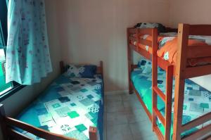 Postel nebo postele na pokoji v ubytování Gîte Baril O'thentik
