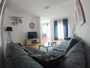 Uma TV ou centro de entretenimento em Apartment Ena
