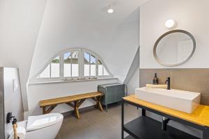 Ένα μπάνιο στο Wanderfalke - Ferienhaus mit Kamin und Sauna für 8 Personen +18 φωτογραφίες