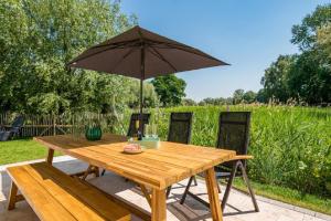 Κήπος έξω από το Kleine Binsenjungfer - Ferienhaus mit Sauna und Kamin für 6 Personen