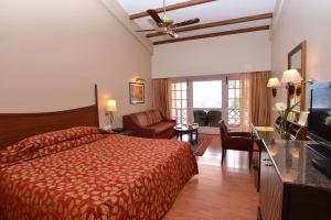 Voodi või voodid majutusasutuse The Carlton Kodaikanal toas