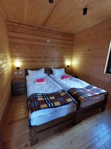 Letto o letti in una camera di Heshkili Cottages