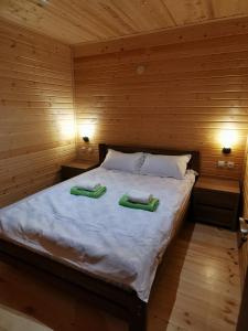 Letto o letti in una camera di Heshkili Cottages
