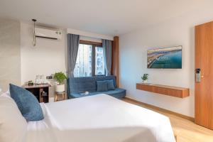 Ένα ή περισσότερα κρεβάτια σε δωμάτιο στο VieLa Apartment Nha Trang +33 φωτογραφίες