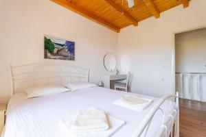 Pinta Apartments客房内的一张或多张床位