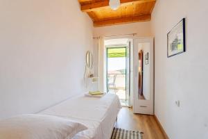 Pinta Apartments客房内的一张或多张床位