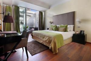 Postel nebo postele na pokoji v ubytování Park Suites Hotel Luxury Boutique Hotel