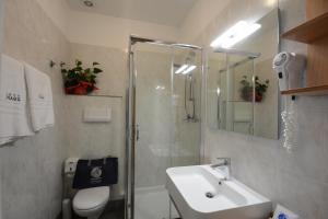 Koupelna v ubytování Hotel Spiaggia