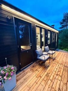 a screened in porch of a tiny house at The Saunacabin Enchanted Lapland in Rovaniemi +20 photos