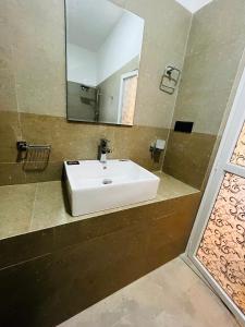 Koupelna v ubytování Viyanga Homestay