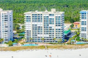 an aerial view of a resort with condos at White Caps Condos in Orange Beach