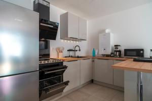 Dapur atau dapur kecil di L'Atlantic - Appt à moins 150m de la plage +5 gambar
